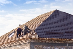 workers working on the roof